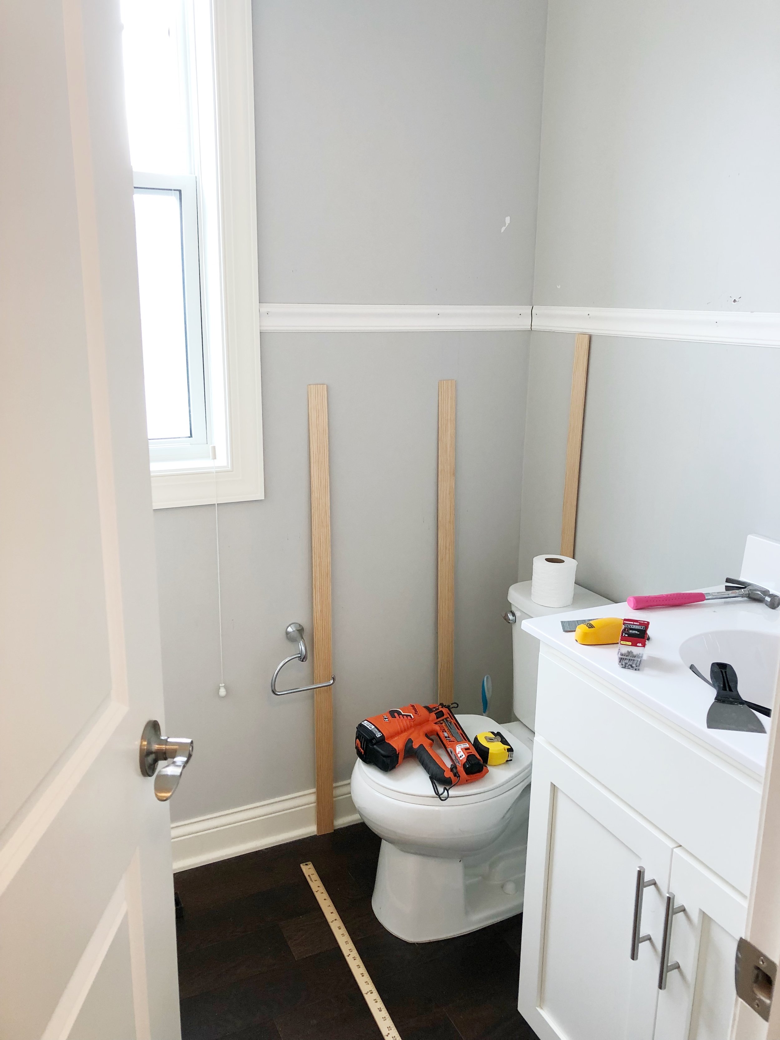 Board and Batten DIY in the Powder Room Bathroom.