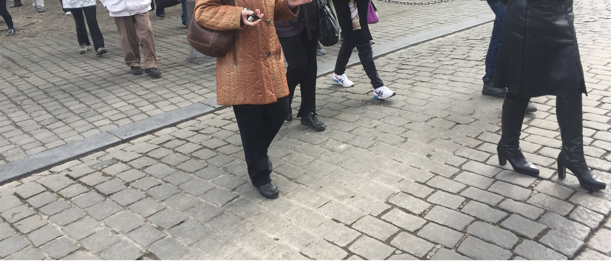 People in Bruges wearing more sensible shoes than me.