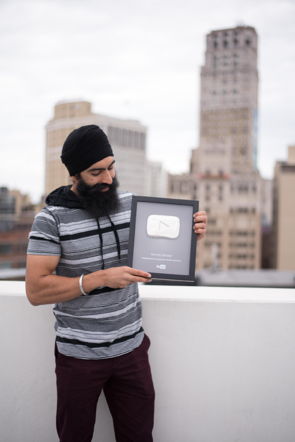 Jaspreet SIngh with the 100,000 Subscriber YouTube Plaque