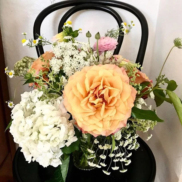 My mother always has fresh flowers in her house, which she buys with what she calls her ‘cigarette money.’ Having only ever smoked *one* in high school, she figures she’s saved up plenty since. And she’s passed this reasoning