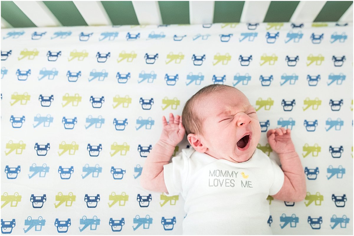 Newborn baby boy yawning | Orlando in-home newborn photography