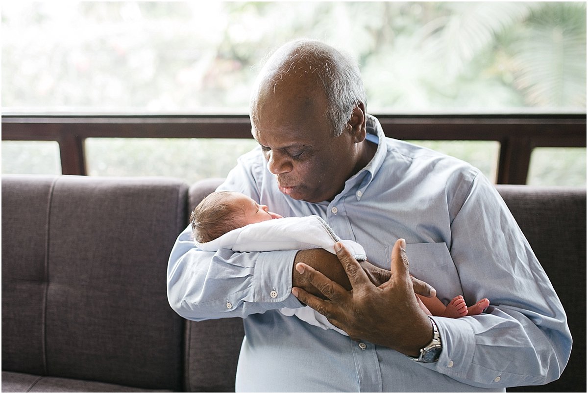 grandpa kissing new grandson | Orlando newborn photographer