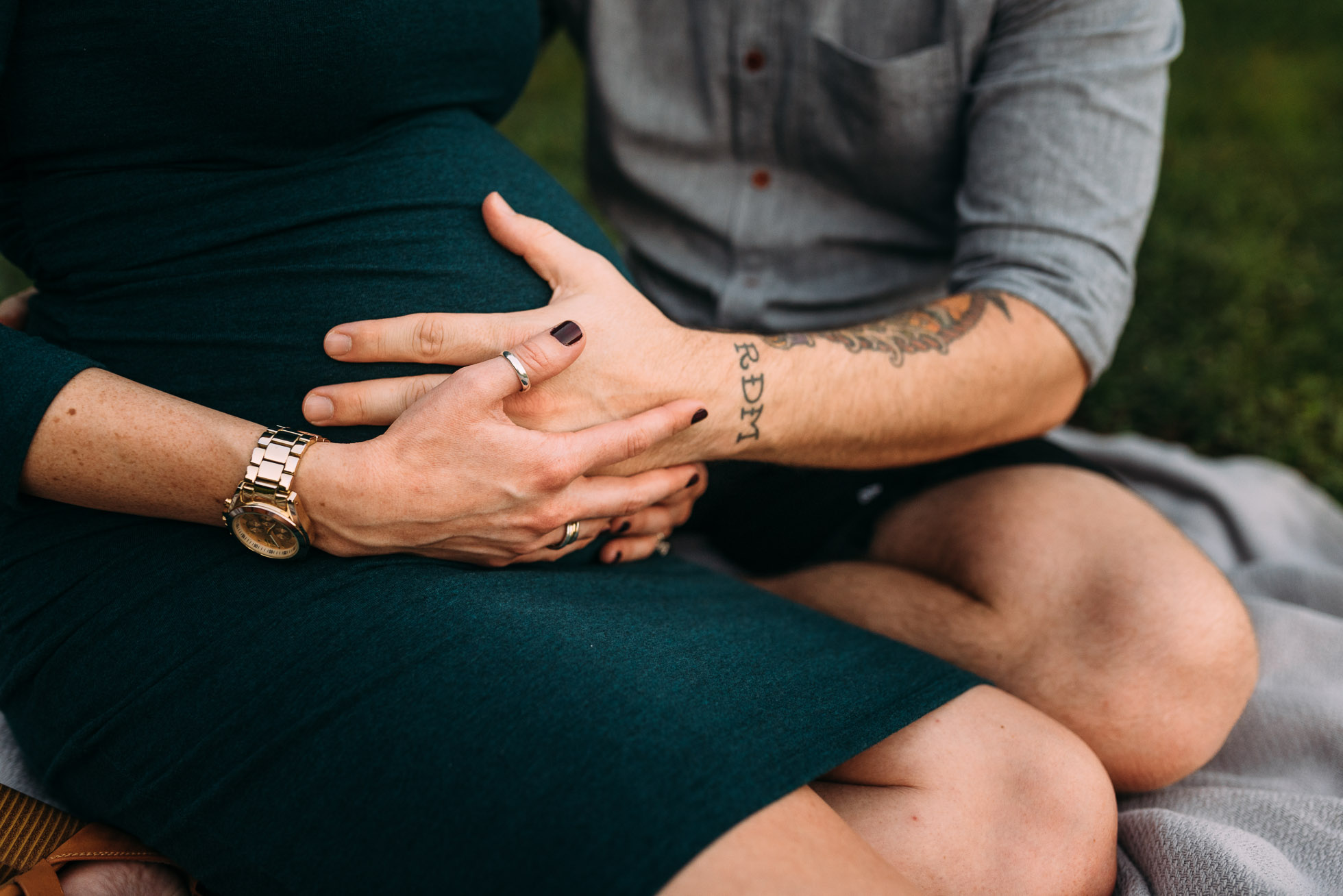 mom and dad holding belly waiting for baby | Orlando maternity photographer