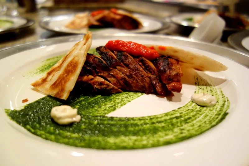 Red Chile Pork Tenderloin, Pesto, Hatch Crema, Bacon Fried Tortilla, Red Chile