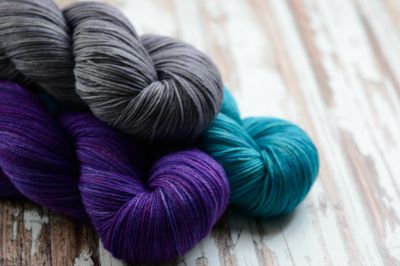 If you are looking to plan your color, make sure you do it proportionally. If you plan to knit a grey sweater with purple and teal accents, throwing these colors together proves only that they do indeed go well together. 