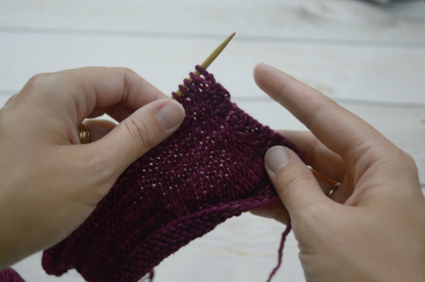 Re-position the yarn. It should look like this.