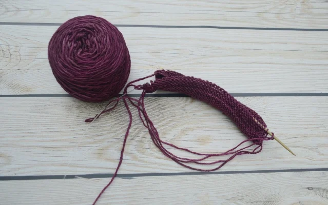 Big yarn blob. No, Wait! I was showing you how the loops hang on the back of the swatch.