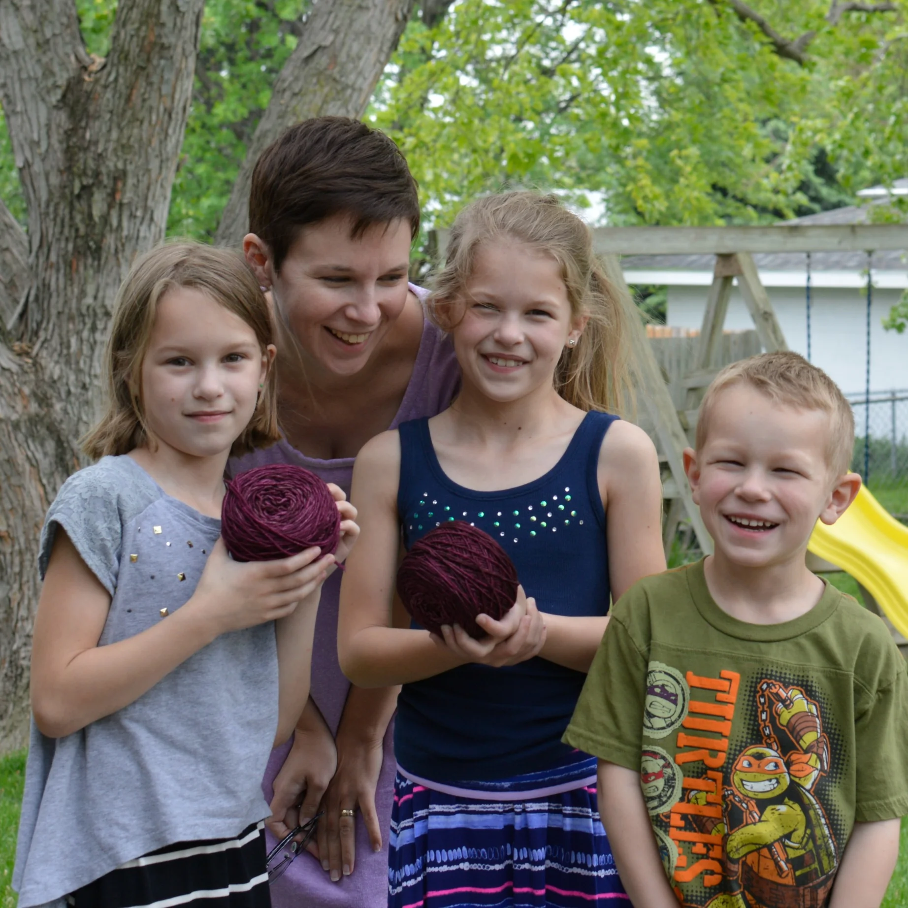 Every year I take a picture of my Mother's Day Cast On yarn and my kids. As I finish and wear these projects, I go back and look at their pictures. They grow up so fast!