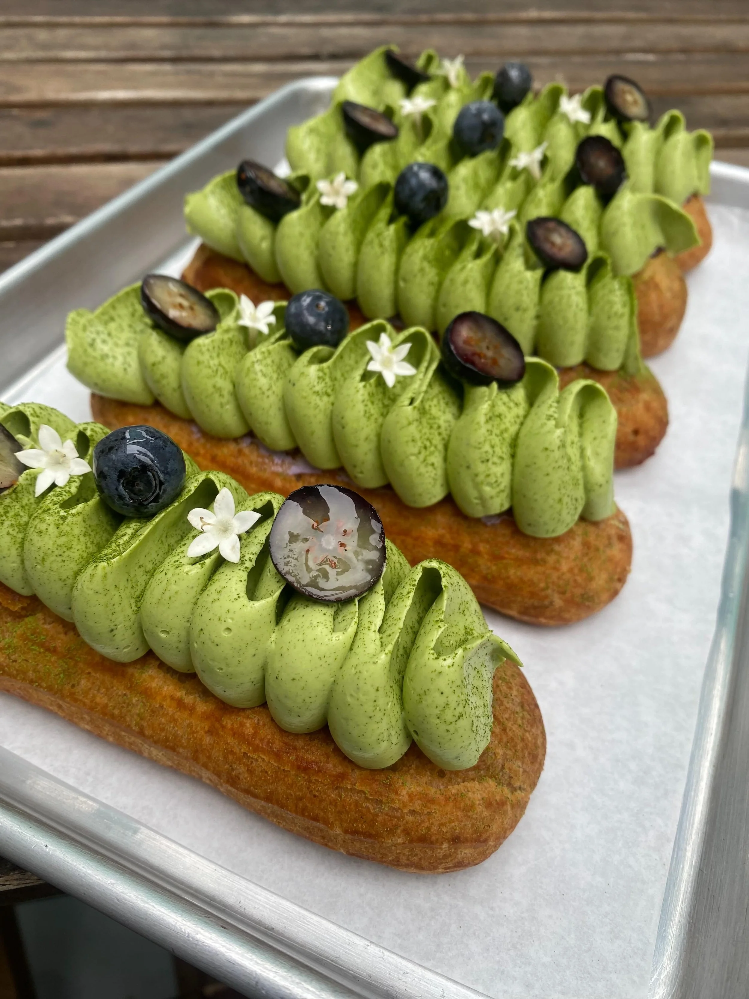 here&rsquo;s our menu for this beautiful weekend:
-pineapple coconut brioche donut
-mango lime cake donut
-Paris Brest choux 💫 strawberry sesame
-eclair blueberry jam, whipped white chocolate matcha
-tart lemon curd- raspberry 
-quiche toasted tomat