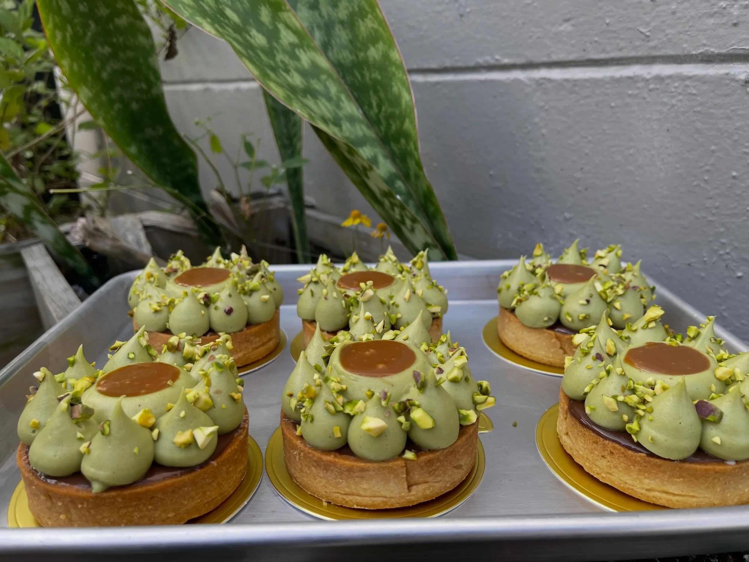 here&rsquo;s our menu for this weekend:
- pistachio caramel tarts
-quiche toasted tomatoes goat cheese- slice
-bostock matcha frangipane, strawberry jam
-passion fruit mousse chocolate ganache  tarts
-vanilla strawberry craquelin choux 
All your favo