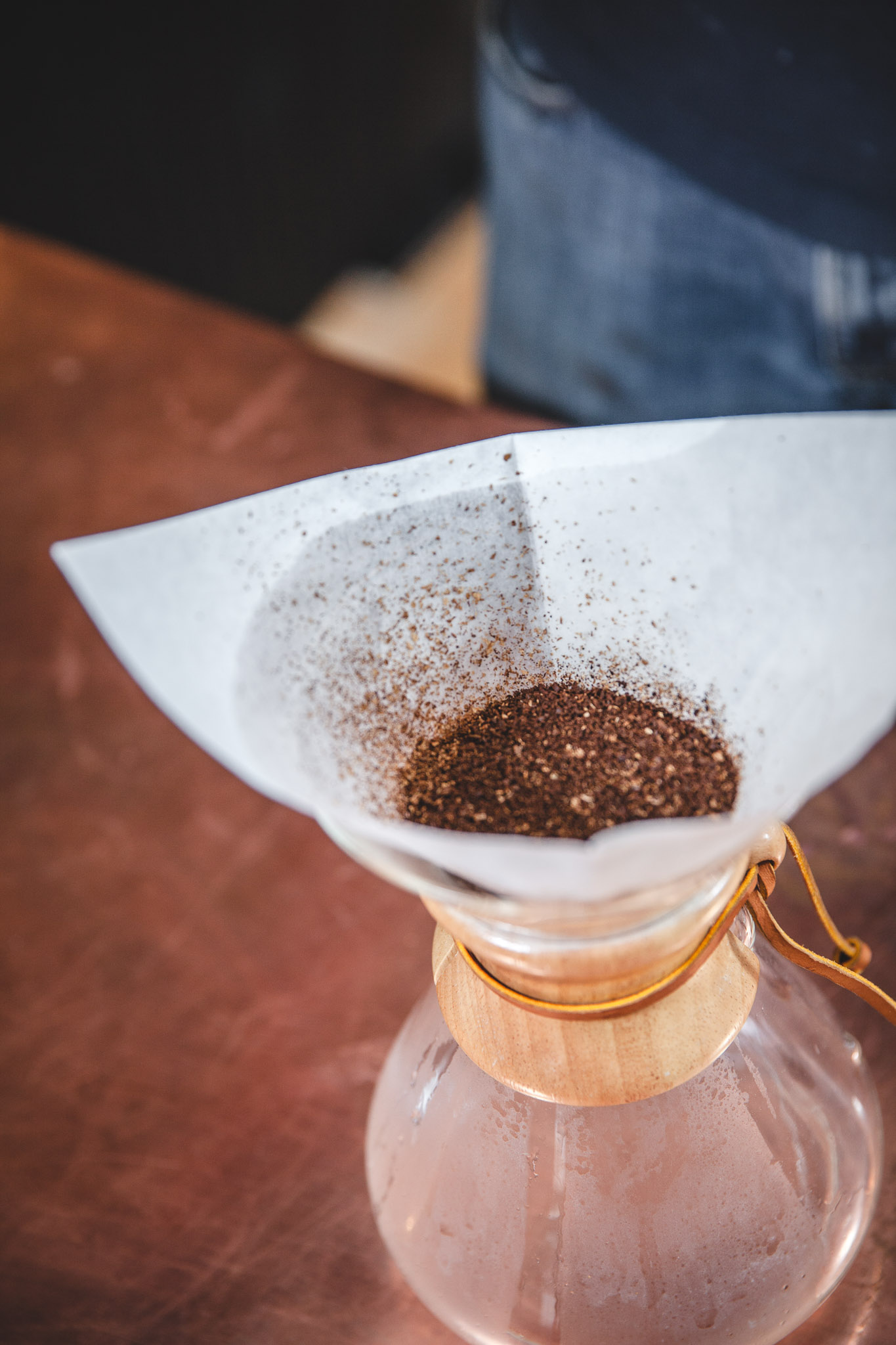 3. Add the ground coffee and gently shake the chemex to flatten the grinds. (This will allow for a more even pour.)