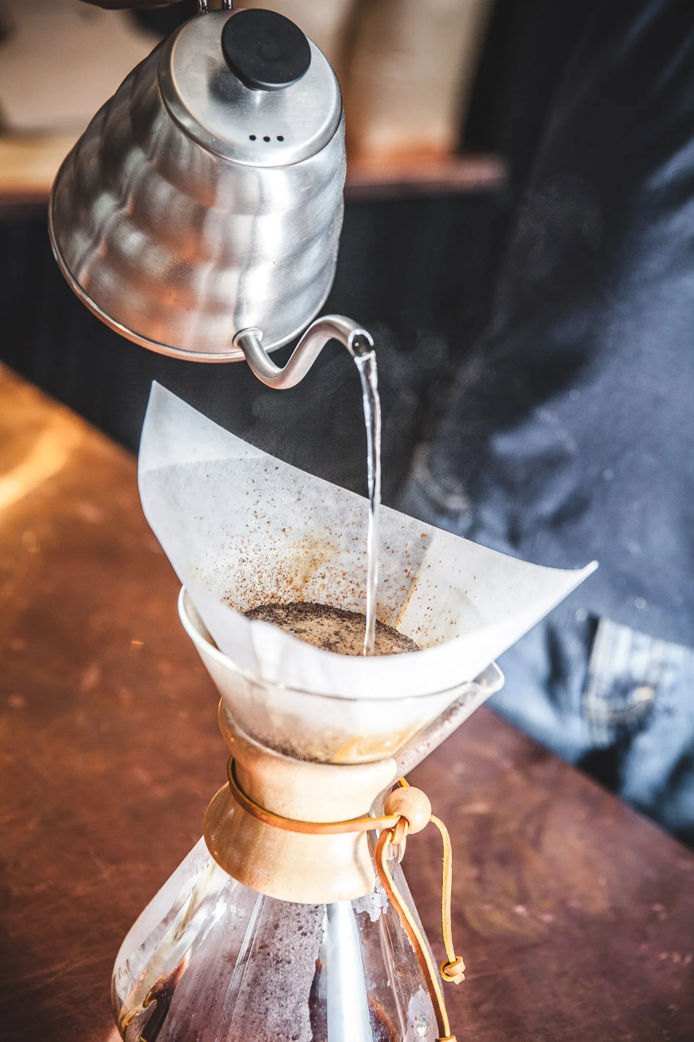 5. Continue adding water in a circular motion until all the water is gone. Total brewing time should be four minutes.