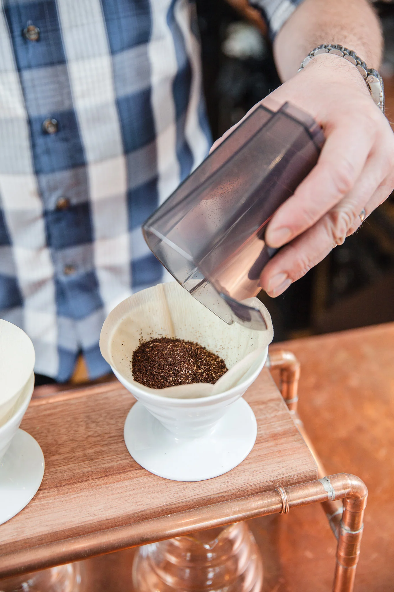 2. Add ground coffee.