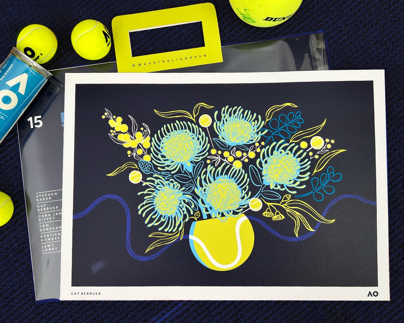 Illustration of a yellow vase with blue and yellow flowers and leaves on a dark background, displayed on a table with tennis balls and related items.