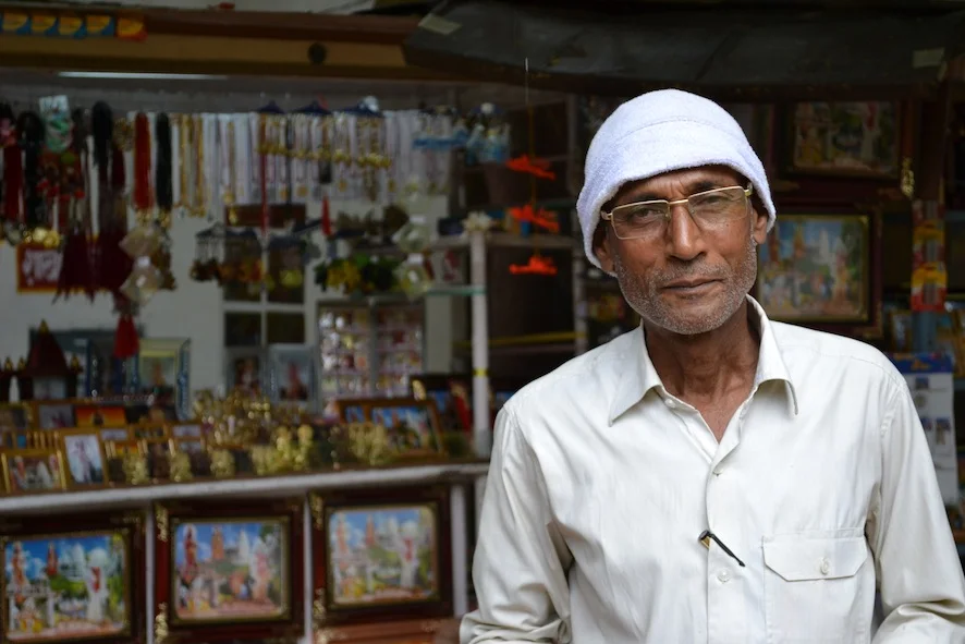 Gulab Singh was able to start his own photography business catering to the influx of local tourists to the temple Punj Lloyd constructed. He was able to build a concrete house, put all of his children in school and buy a motorbike.