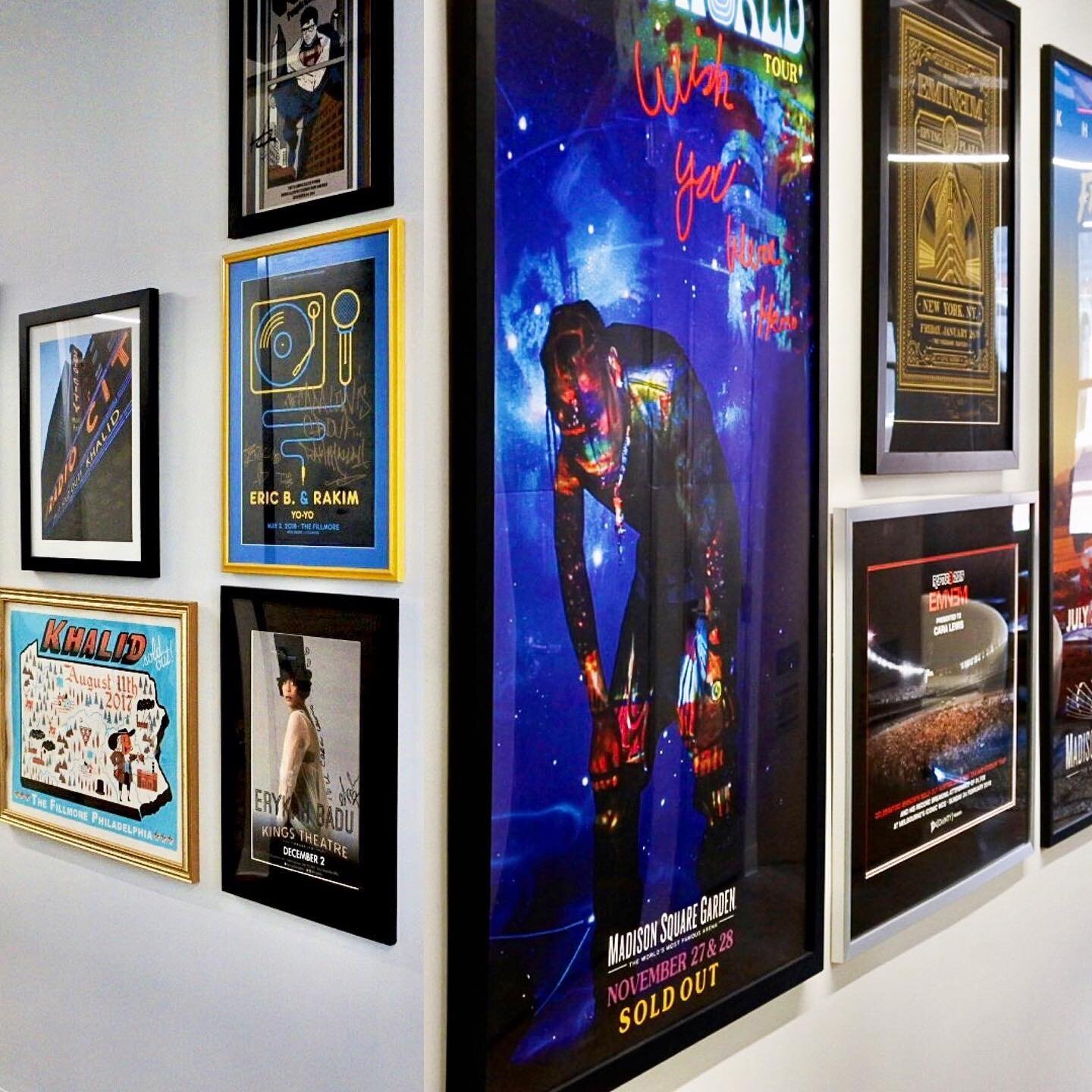 Another Shot from Cara Lewis Group office @clewisgroup. Gallery walls showcase so much talent we ran out of space installing it. #caralewisgroup #officedesign #gallerywall #officedecor #gallery #graphicdesign #commercialdesign 
.
.
.
#musicmogul #tra