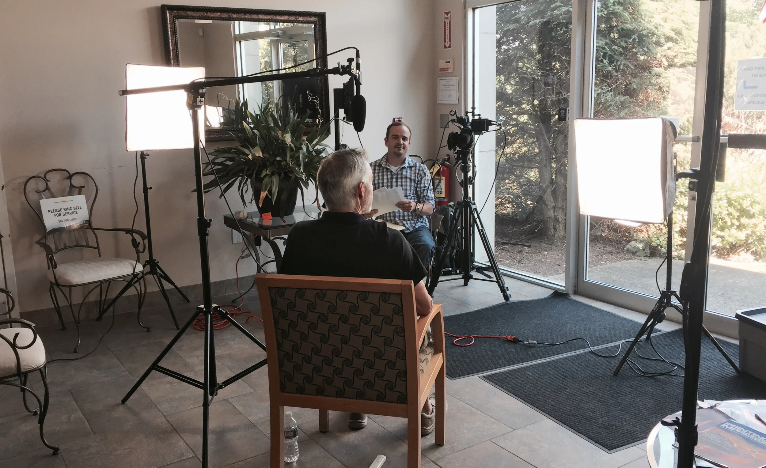 Video production has a lot to do with knowing how to use light. We're using these big windows which are providing amazing interview lighting with just a little help from our lights.