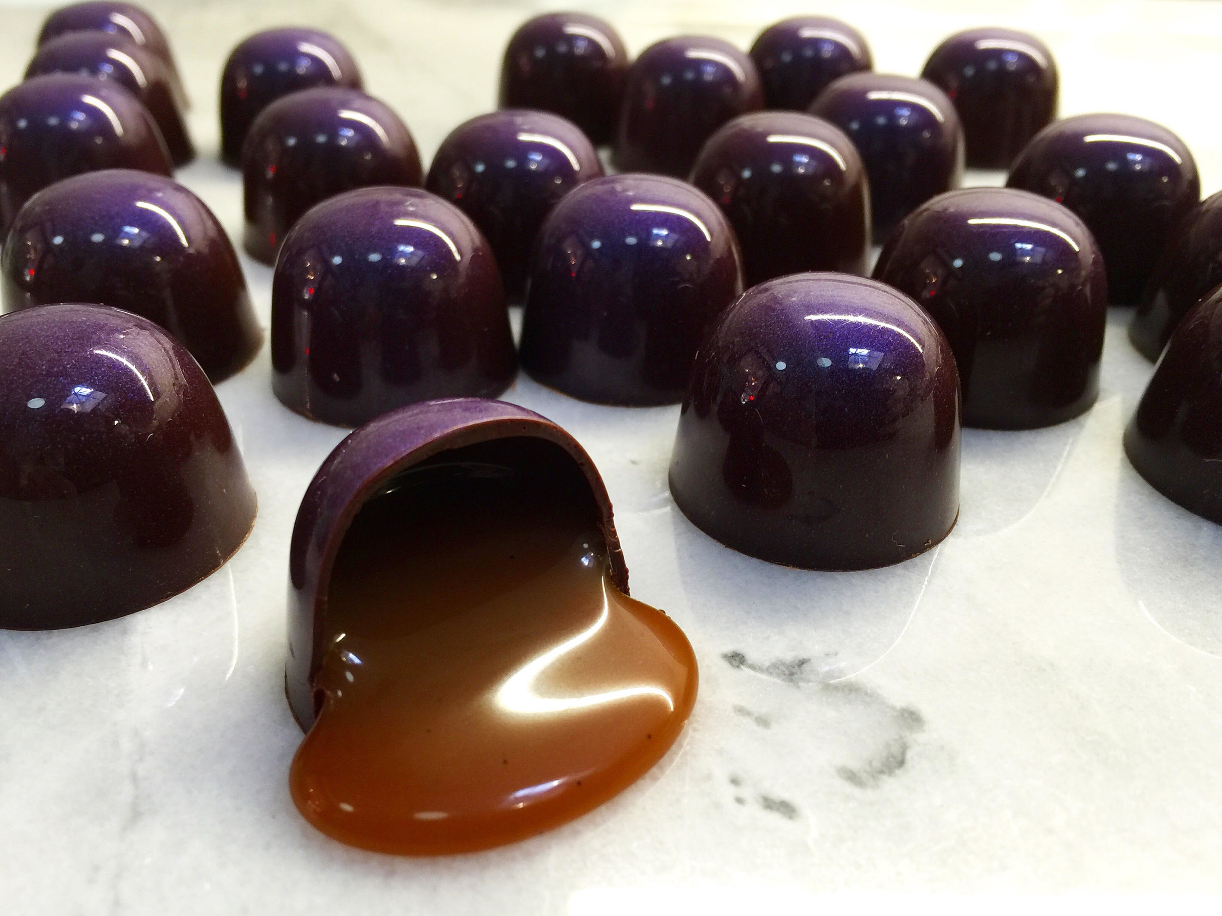 I have a hard time not going to Stick With Me Sweets every day. Usually I live by the rule that the prettiest desserts taste the worst, and vice versa, but Susanna Yoon’s work is stunning and scrumptious. No surprise that she uses Valrhona. Liquid salted caramel pouring onto marble, get in my mouth.
