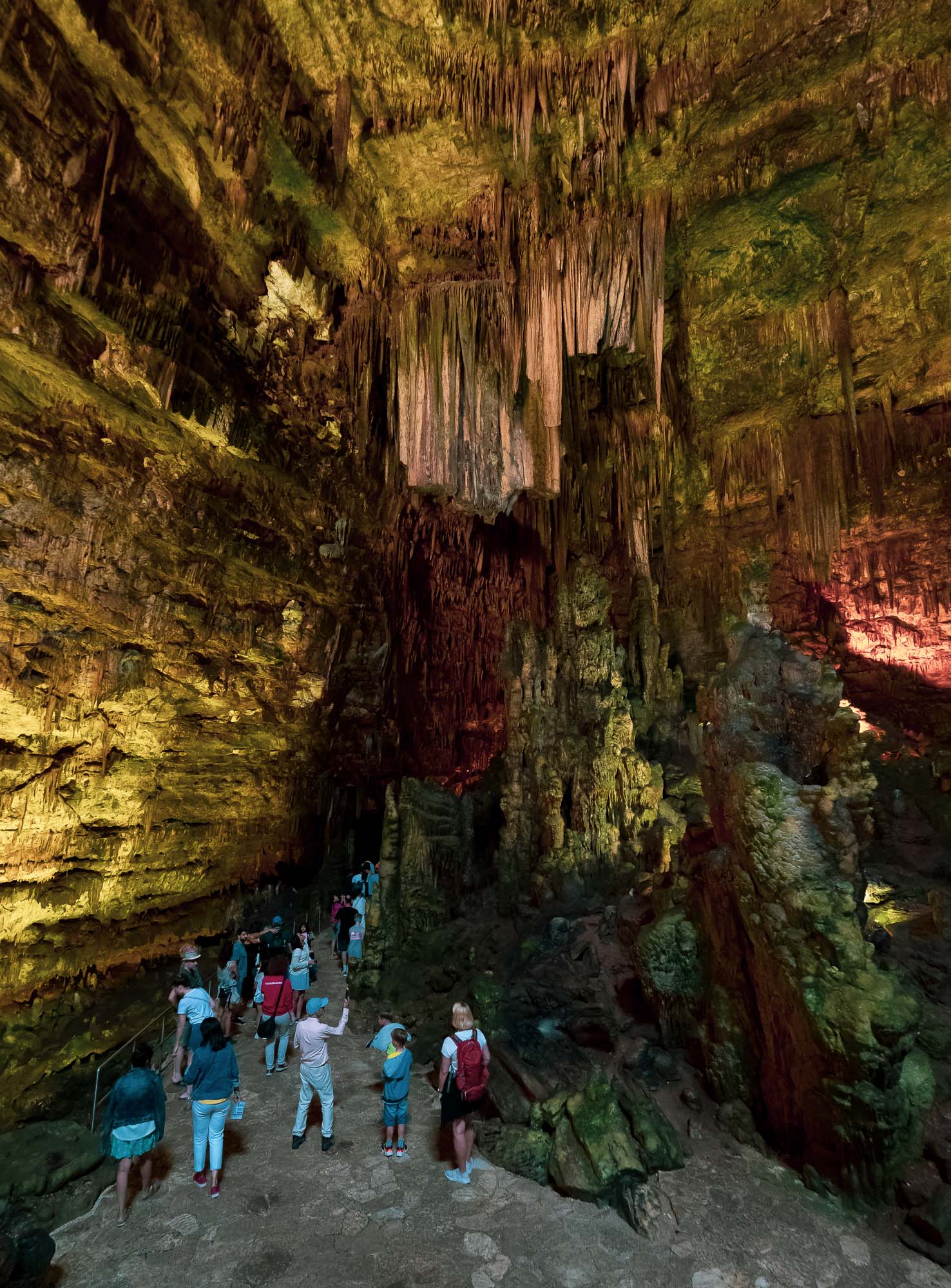  Stalactites and stalagmites embellish almost every wall in the caves. Humans for scale... 