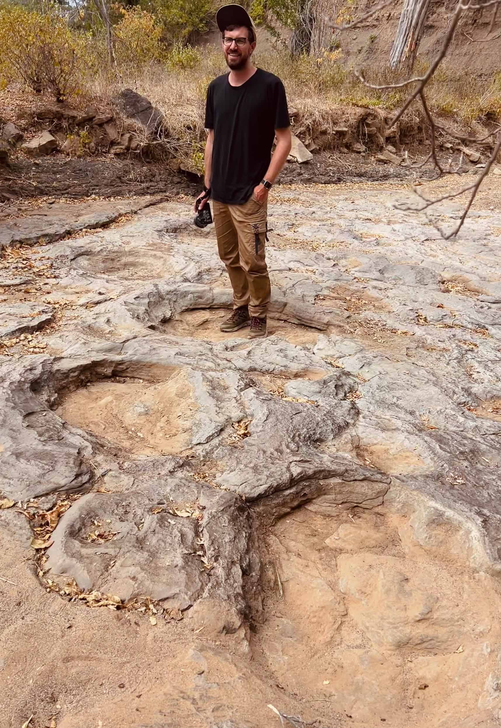  I couldn't resist standing in the footprints of these giants - they were up to 15m tall. If you look closely, the bottom right print shows a crescent shape on top of the actual round foot - a sign of the front legs. 