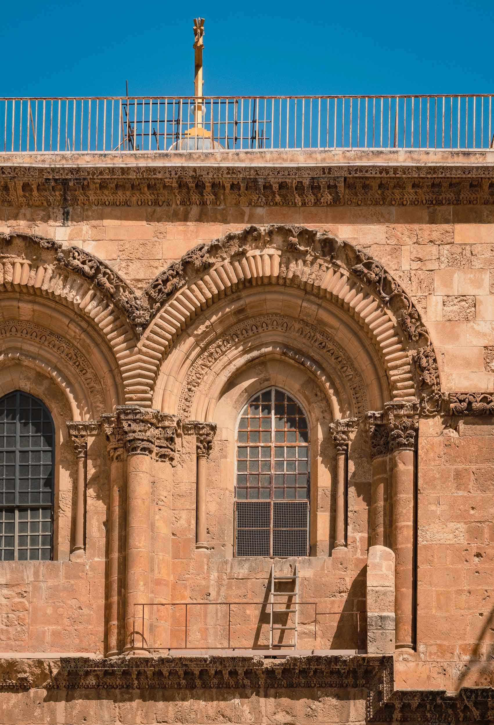  Nothing exemplifies this more than the  Immovable Ladder  on the exterior wall of the Church of the Holy Sepulchre, in place since 1728 to represent the clause that none of the six Christian churches may alter any of the physical aspects of the chur