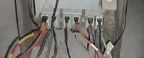 Common temporary set-up of an electrical panel with GFCI outlets found on a construction site.