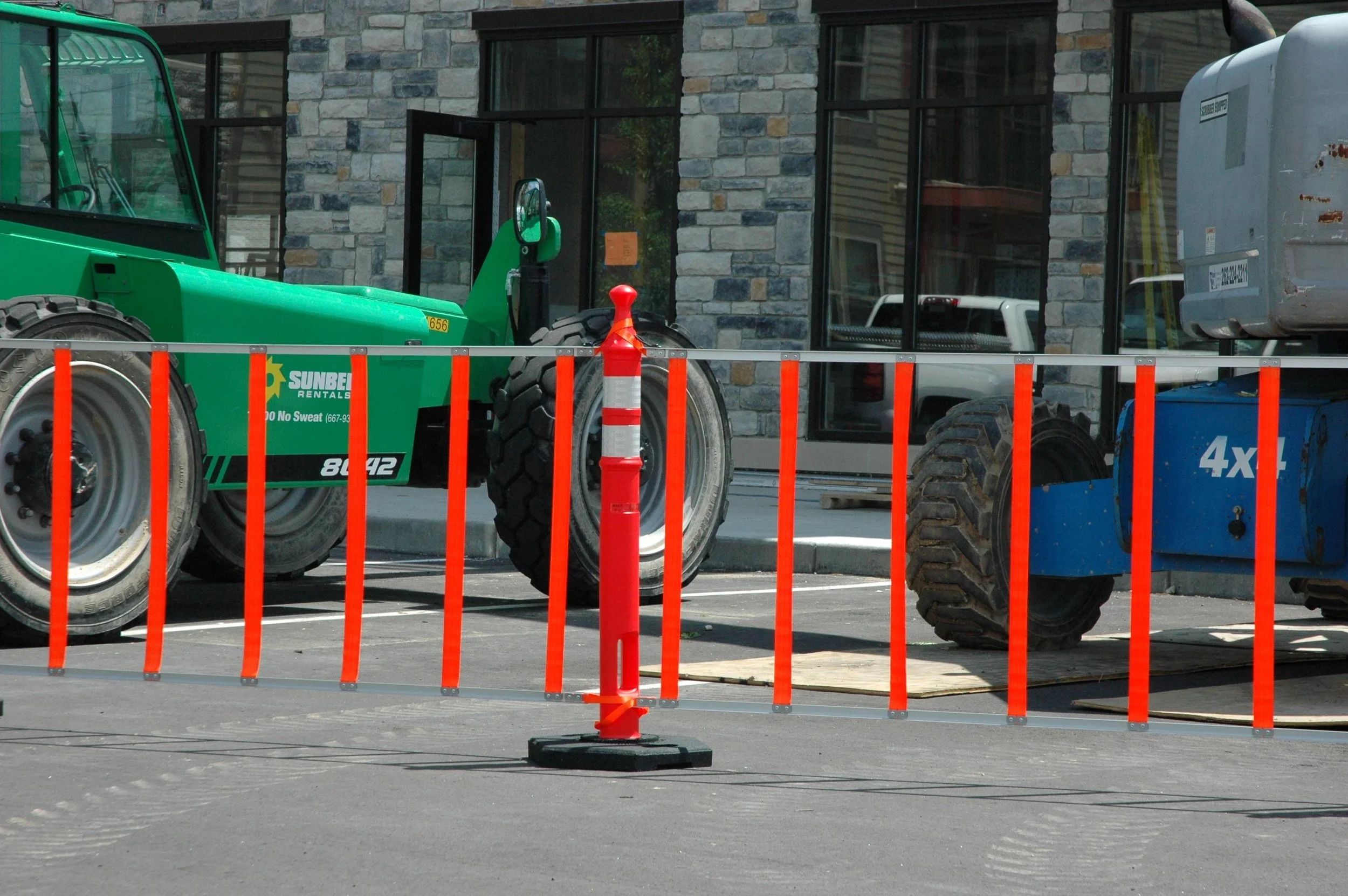 R.U.F. Roll-Up-Fence is an innovative solution to protect dangerous work sites and pedestrian traffic zones. Image courtesy of Omega Industrial Products ( www.omegaindl.com ).