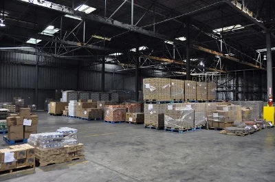 Warehouse with good housekeeping and a designated aisle way.