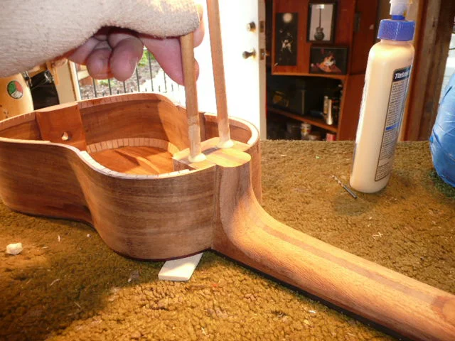  Typically Ukes are given two screws 