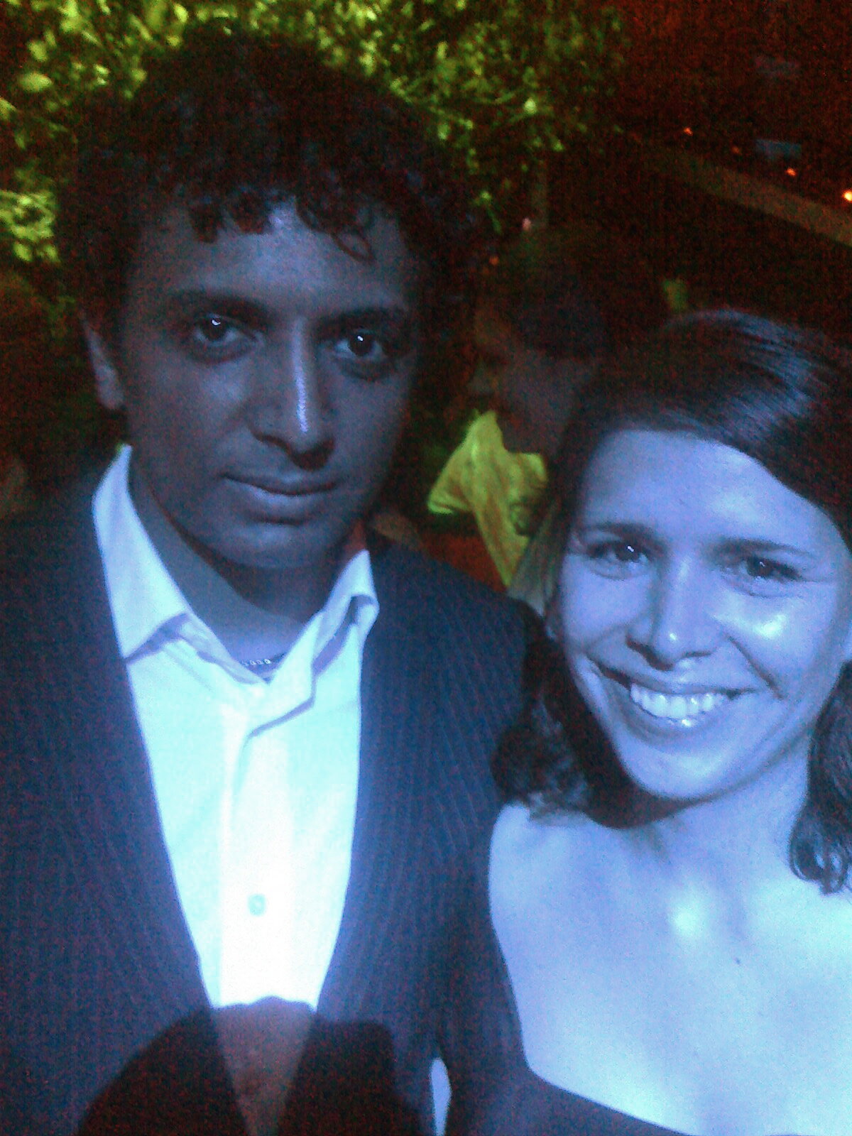 Ana Cuadra with M. Night Shyamalan at an event