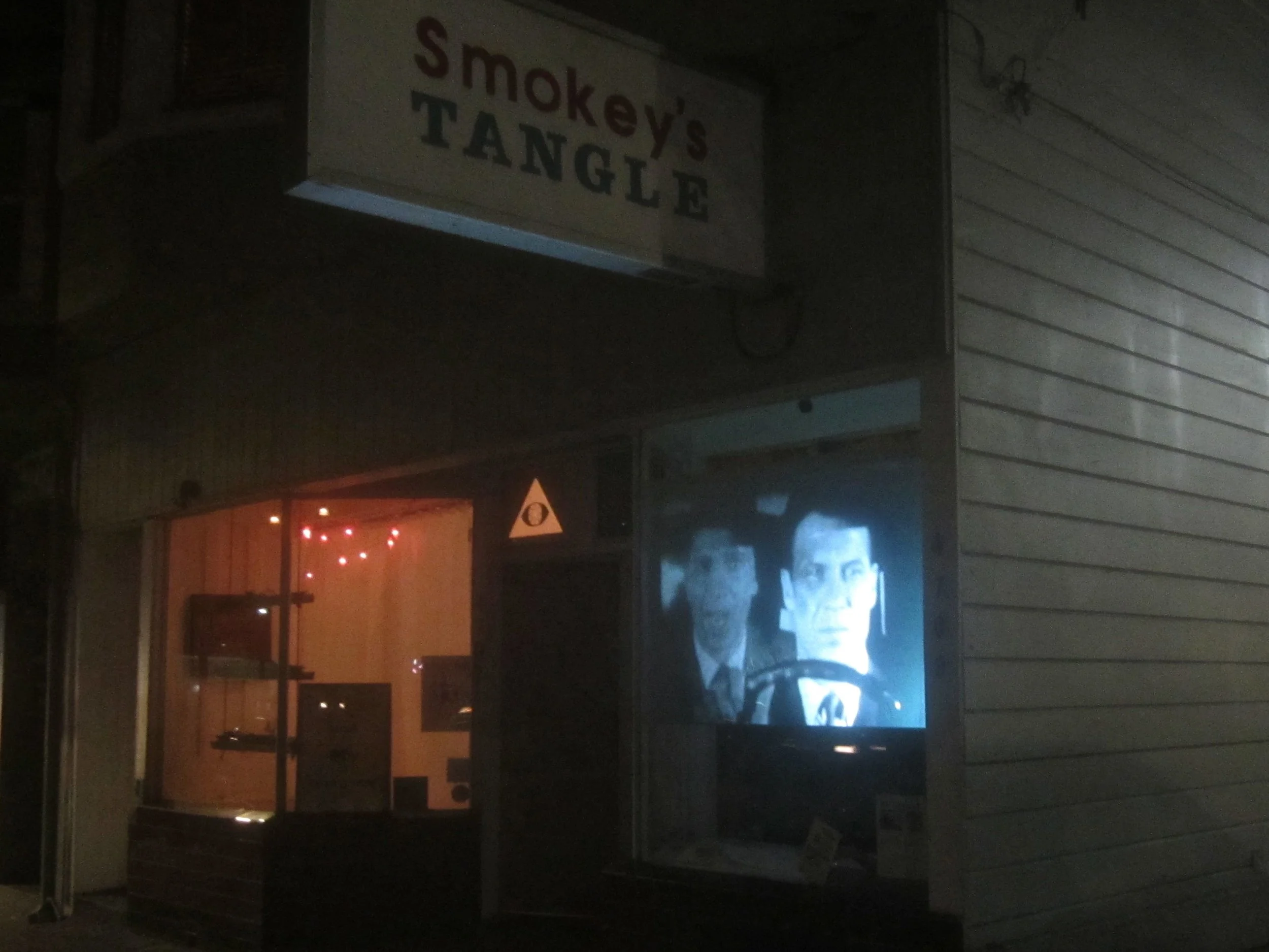 Betaville 2014 Smokey’s Tangle, Oakland CA I rear-projected my film "Betaville" on the inside of the gallery window. The 1-hour long film looped & played for 3 hours each evening for a month.