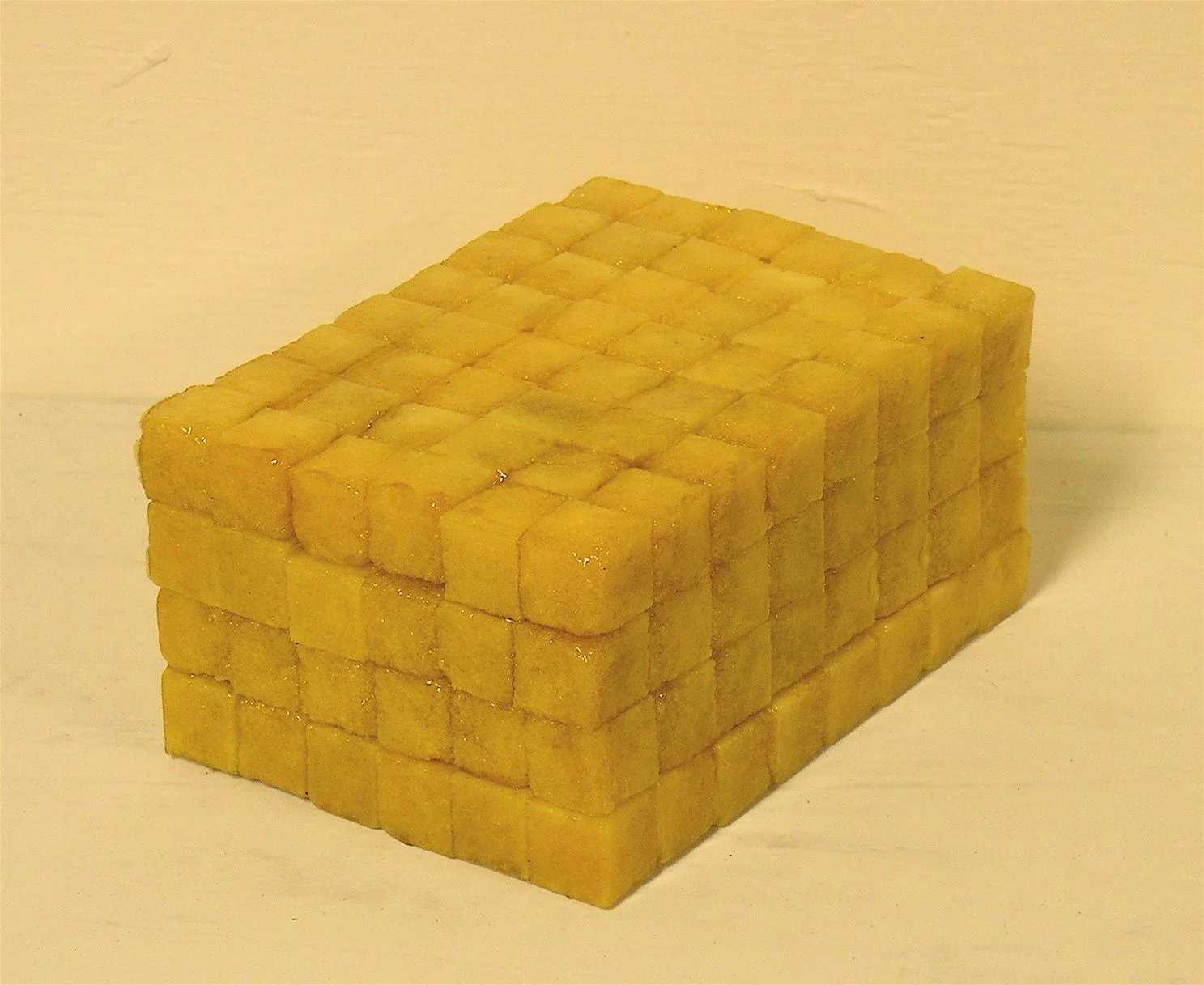 Brick 2007 sugar cubes, wood glue, spar varnish 5" l x 3.5" w x 2.5" h Exhibited as a component of Lost Coming Back This Way at Cricket Engine, Oakland CA 2007 Collection of Lexa Walsh