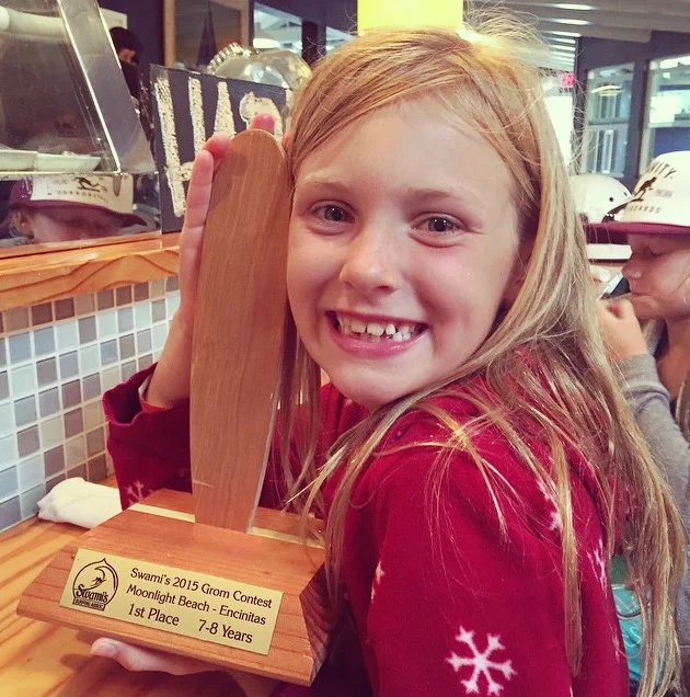 Maile Garrett showing off her 1st place trophy from her first contest!