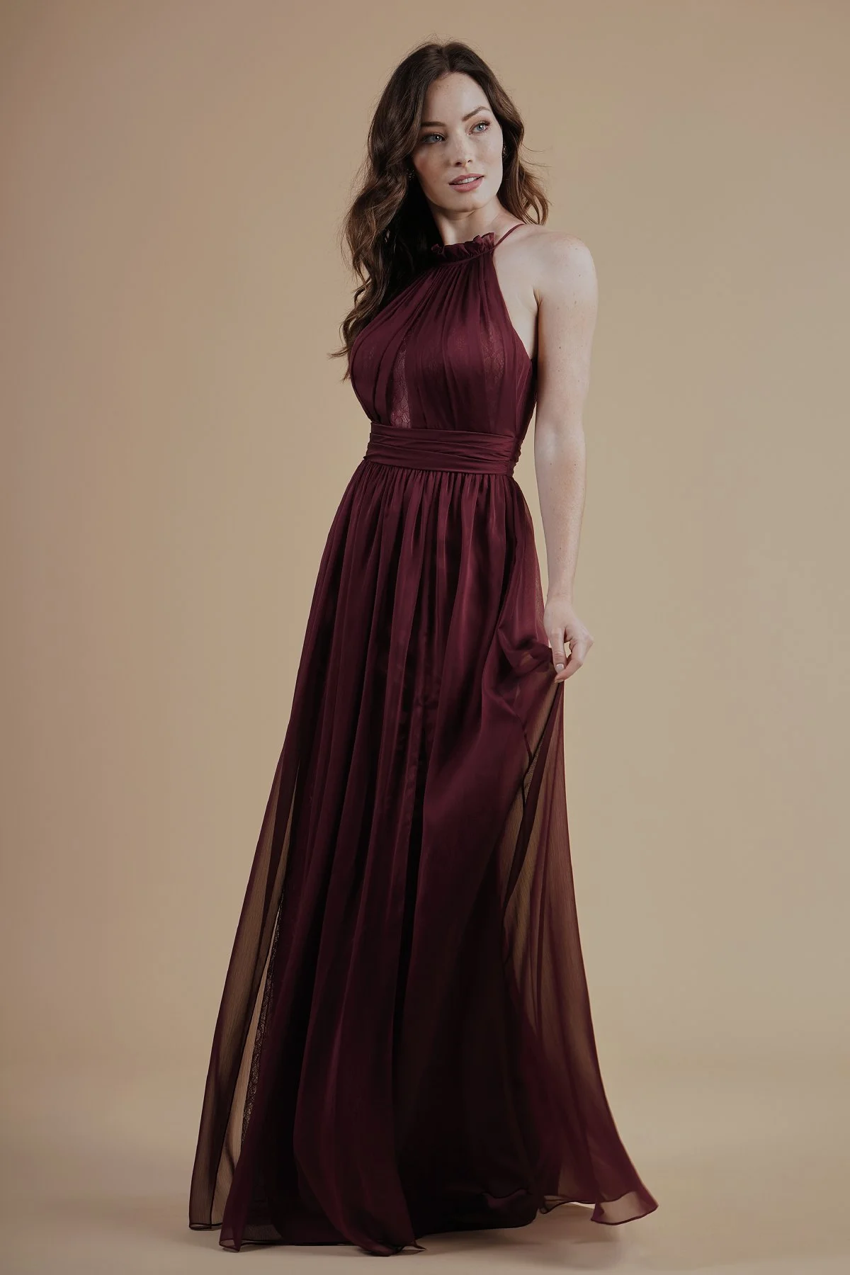 L214004 - Gorgeous Belsoie Tiffany Chiffon and lace floor length bridesmaid dress with a beautifully ruffled high neckline. A lace back bodice, lace detail on the bodice, and detailed gathers throughout the dress. Available in 16 colors