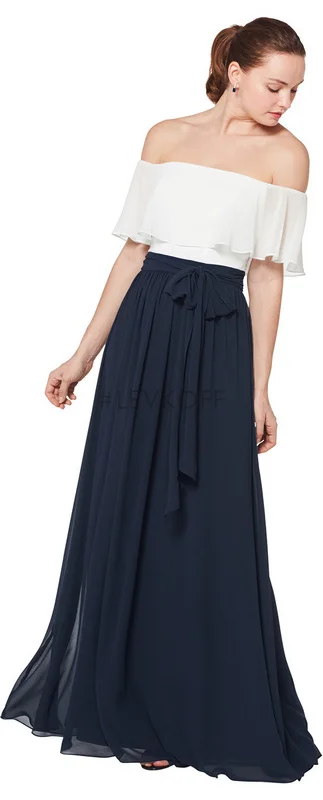 7074 - Chiffon off the shoulder gown with a ruffle bodice. Self tie accents the natural waist. Soft gathers surround the A-line skirt. Available solid or two-tone. Available in 43 colors