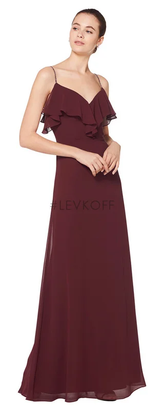 7075 - Chiffon V-neck gown with beaded spaghetti straps. Ruffle trim accents the bodice with a wide U back. Available in 43 colors