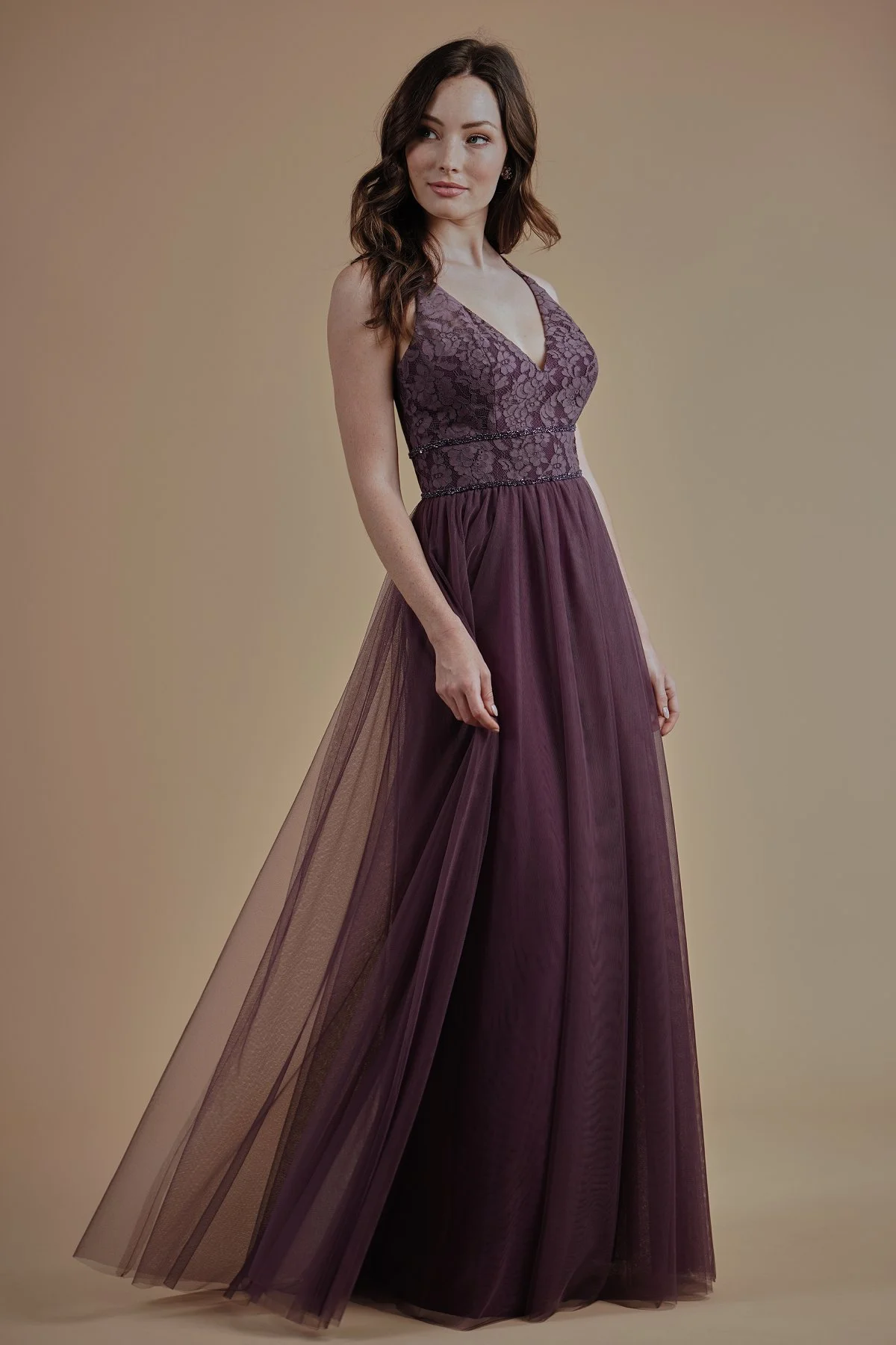 L214008 - Beautiful lace and soft tulle floor length bridesmaid dress with a flattering V-neckline. Detailed beading on the bodice and a flowy skirt. Available in 17 colors