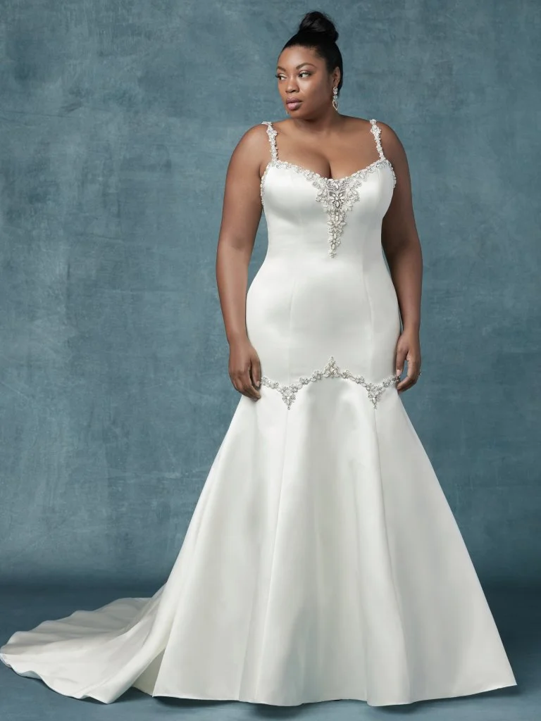 Latoya - Exquisite beading and Swarovski crystals trim the trumpet skirt and bodice of this Carlo satin wedding dress, completing the illusion scoop neckline and spaghetti straps. Finished with zipper and inner elastic closure, with covered buttons trailing from back to hem. Detachable cold-shoulder straps accented in beads and Swarovski crystals sold separately. Also available in Blush Elegance satin, Available in: White, Ivory, Alabaster