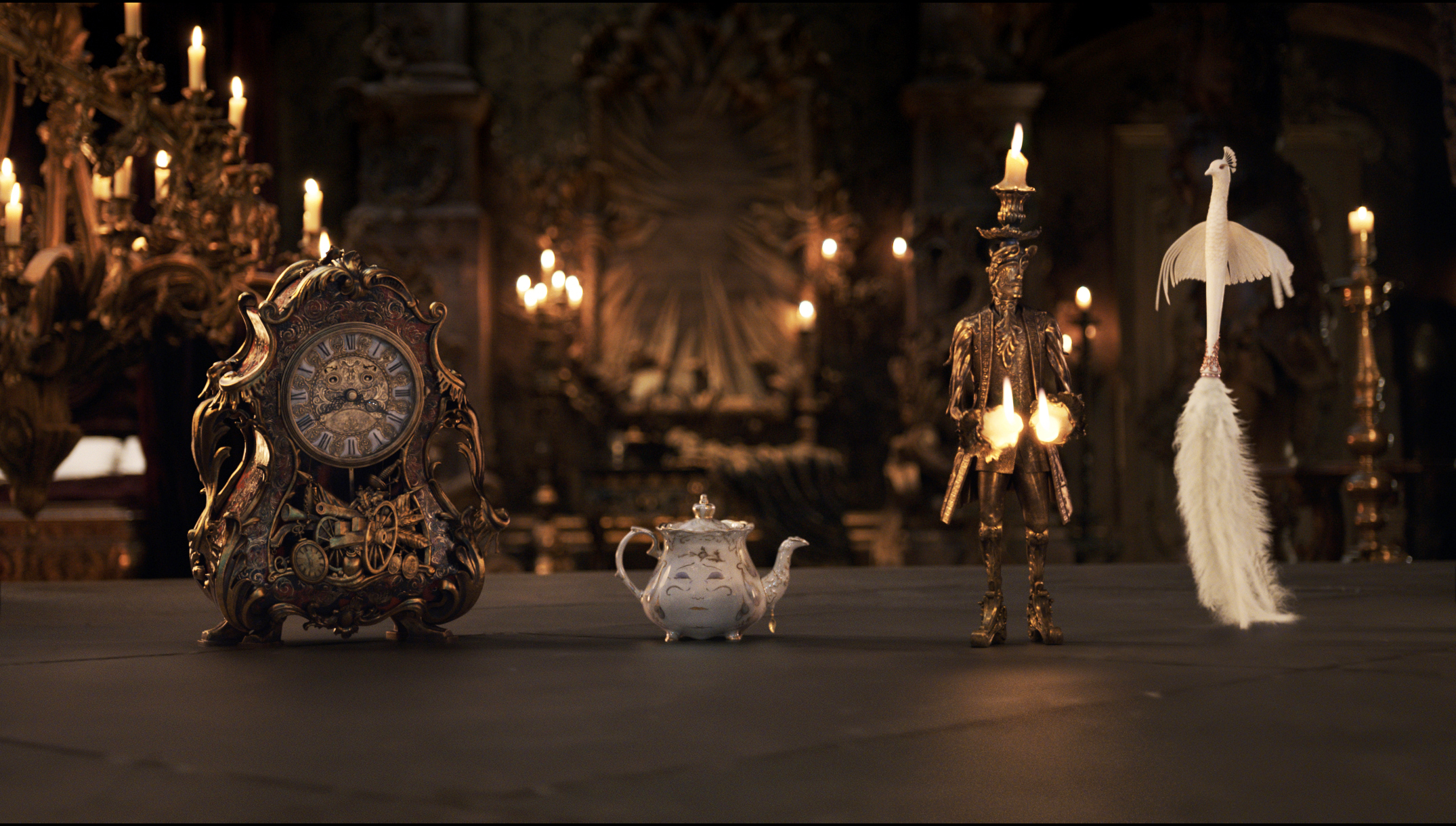Check out the cool reimagination of the household objects: Cogsworth (McKellen), Mrs. Potts (Thompson), Lumiere (McGregor) and Plumette (Mbatha-Raw).