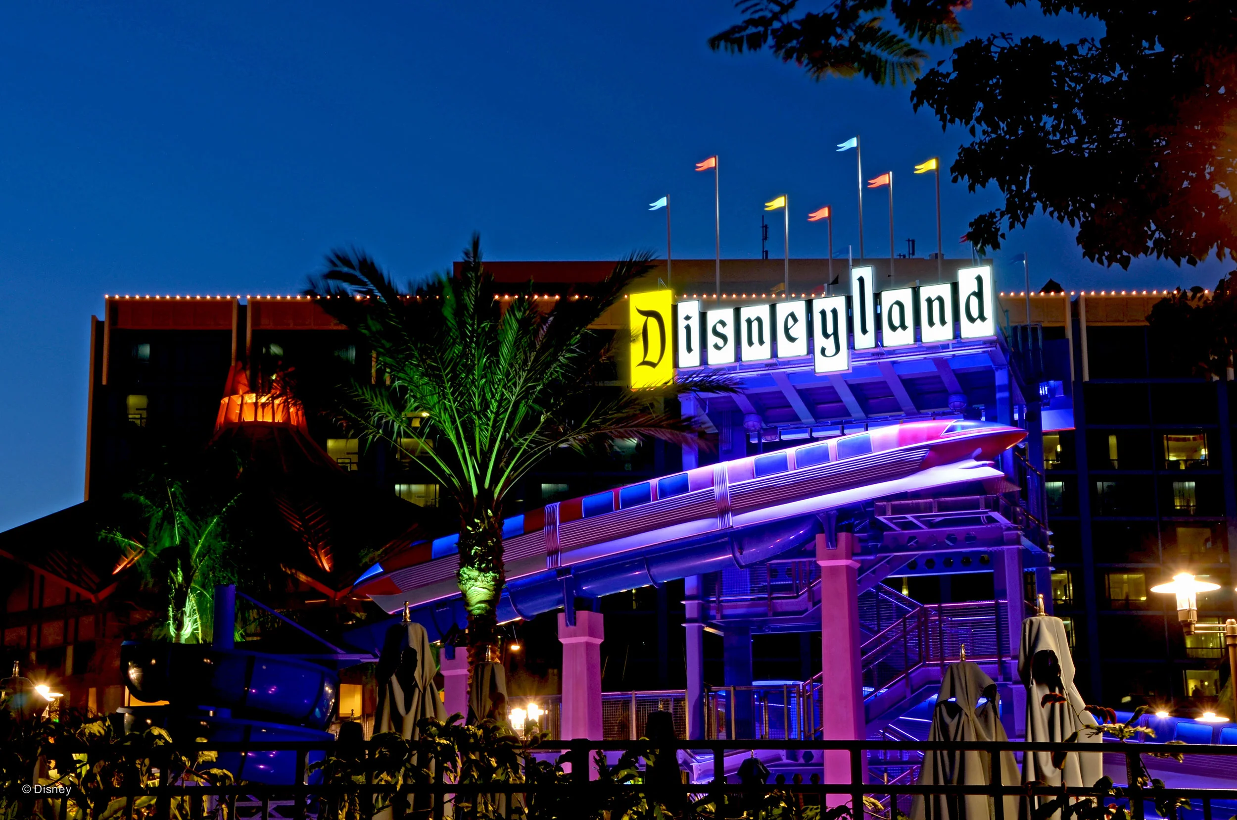 The Disneyland Hotel resort grounds are super pretty at night. This is the pool located on the way to Trader Sam's.