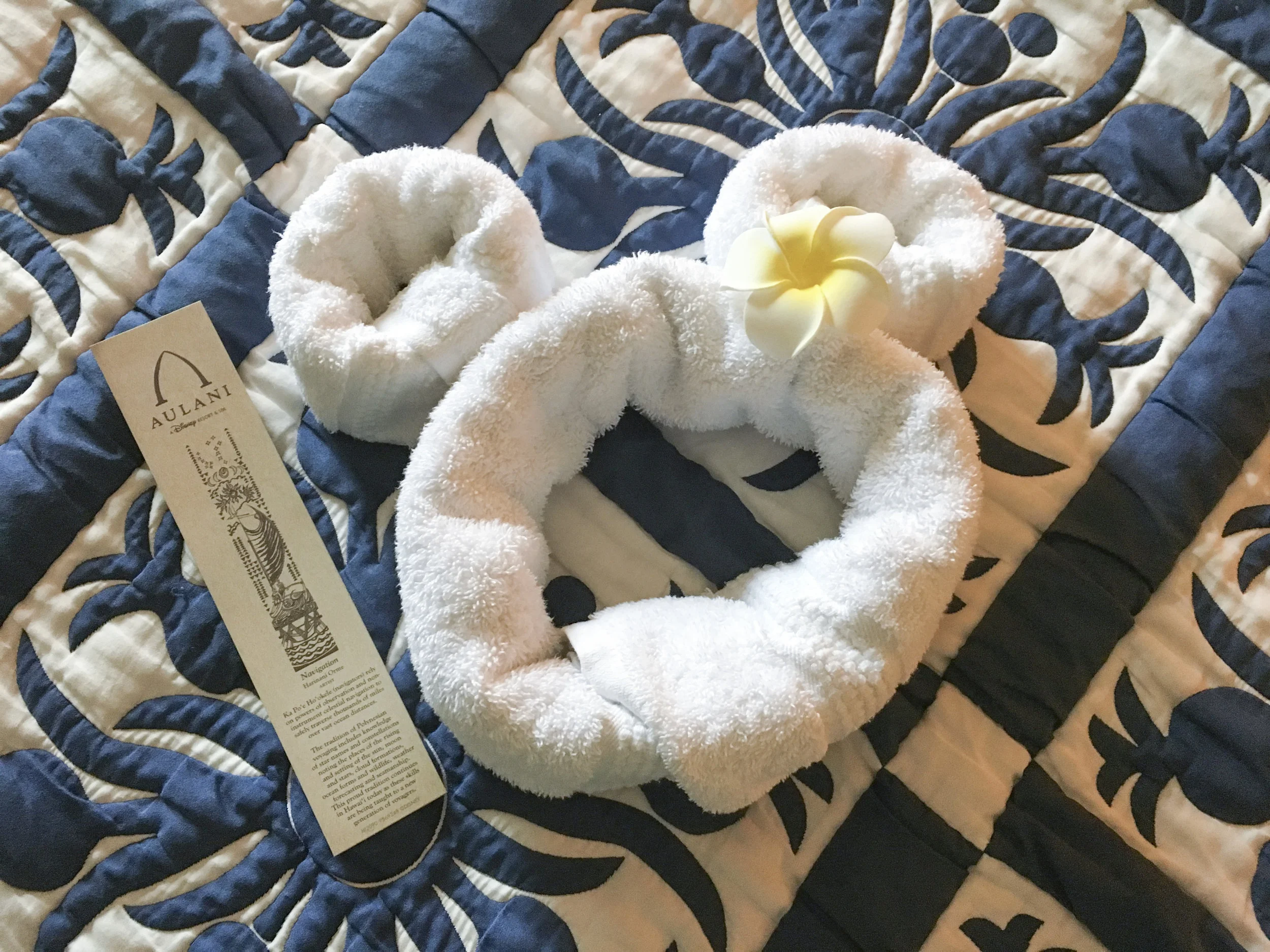 Housekeeping left a Mickey towel adorned with a flower hair clip.