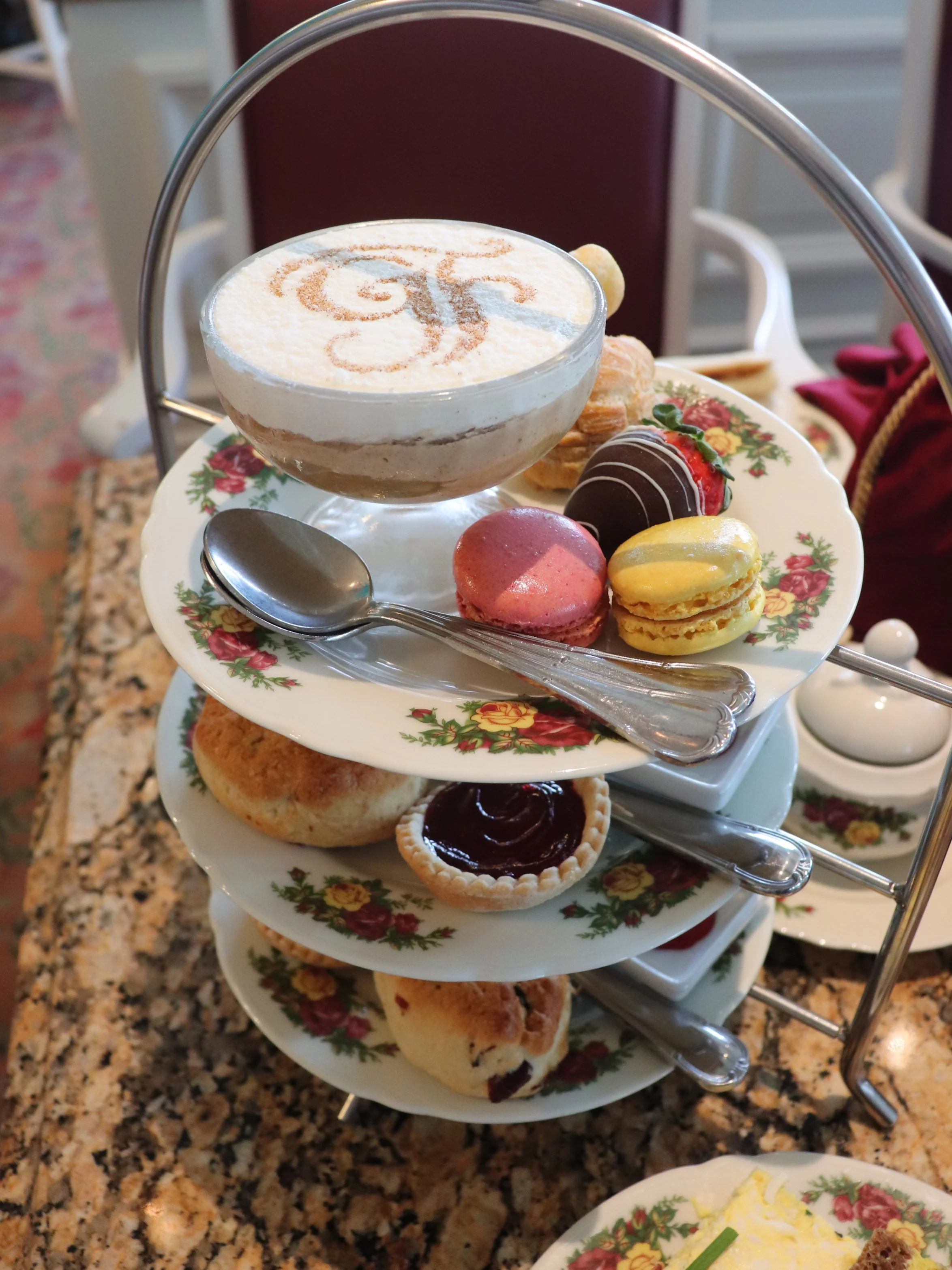 A triple tier server houses all the sweets.