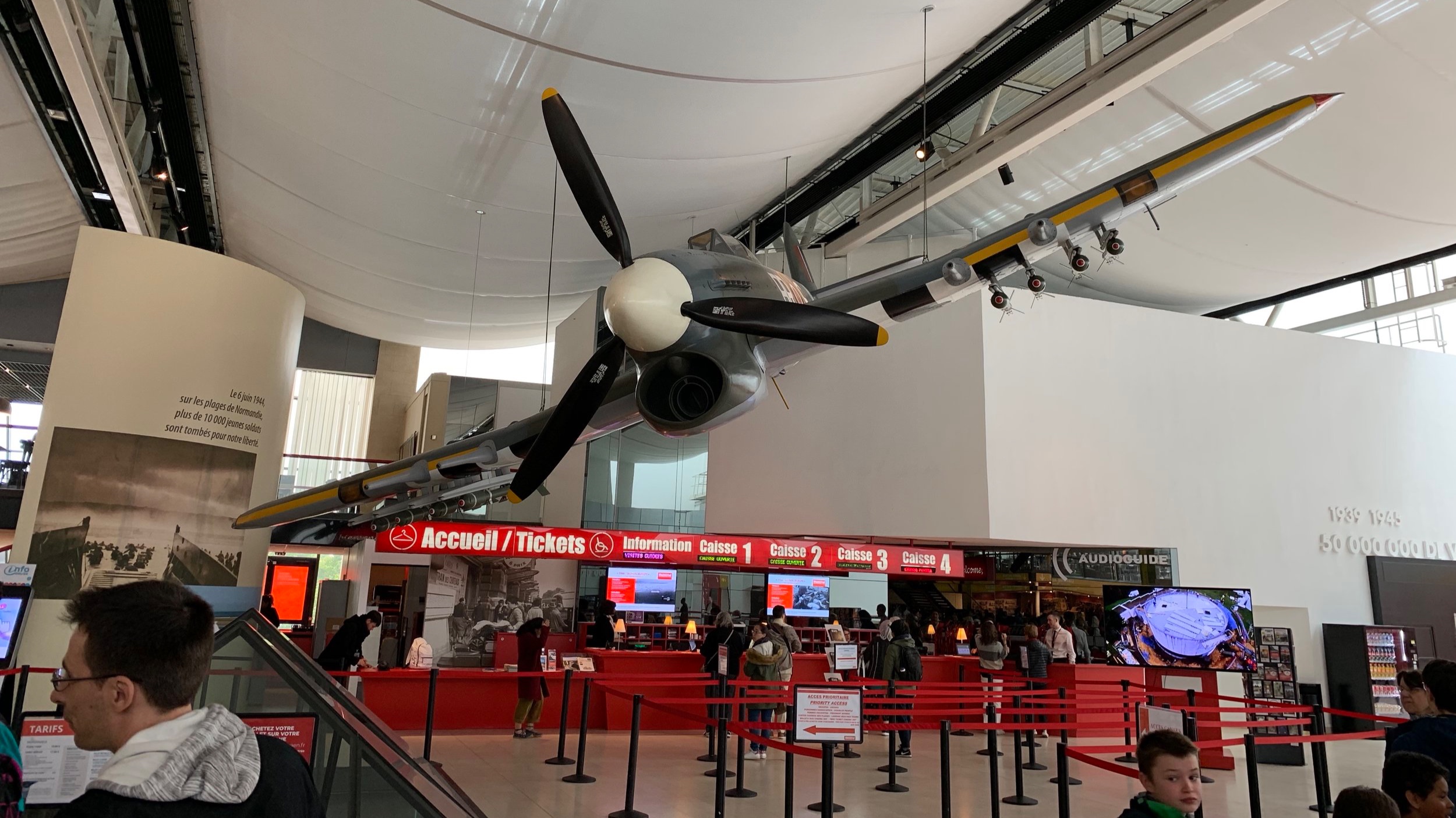 The main lobby of the museum featured a war plane suspended from the ceiling.