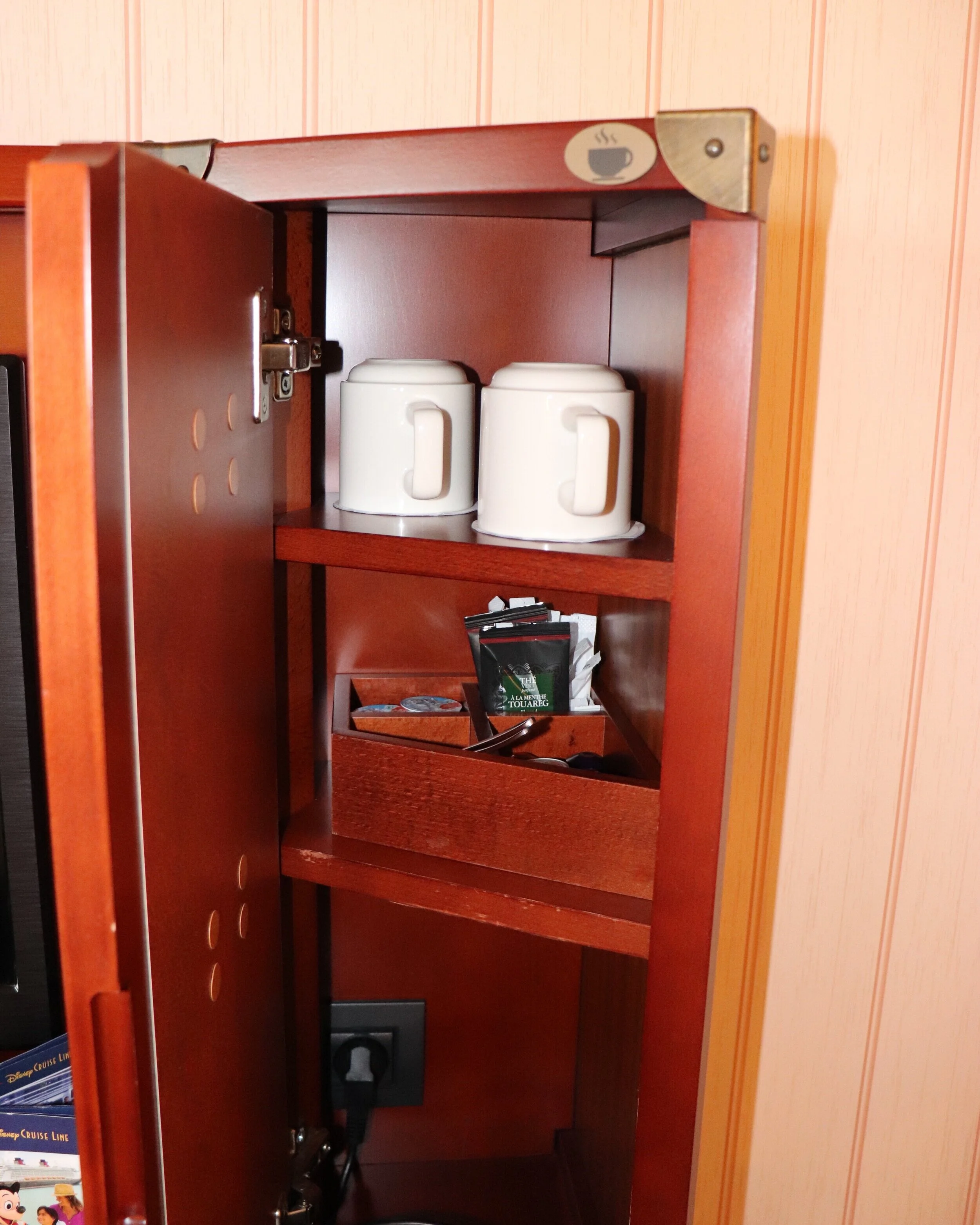 Tea supplies in the dresser.