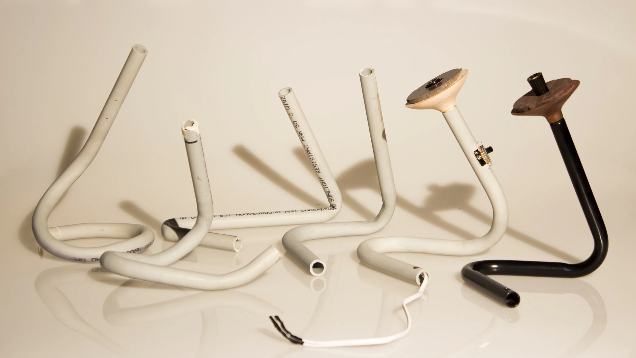 Form exploration through heat-bending PVC pipe.