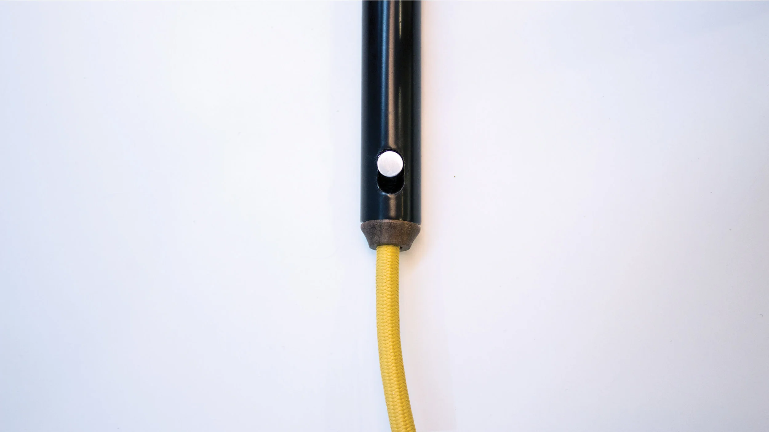 Aluminum detail on in-line switch and turned walnut end cap