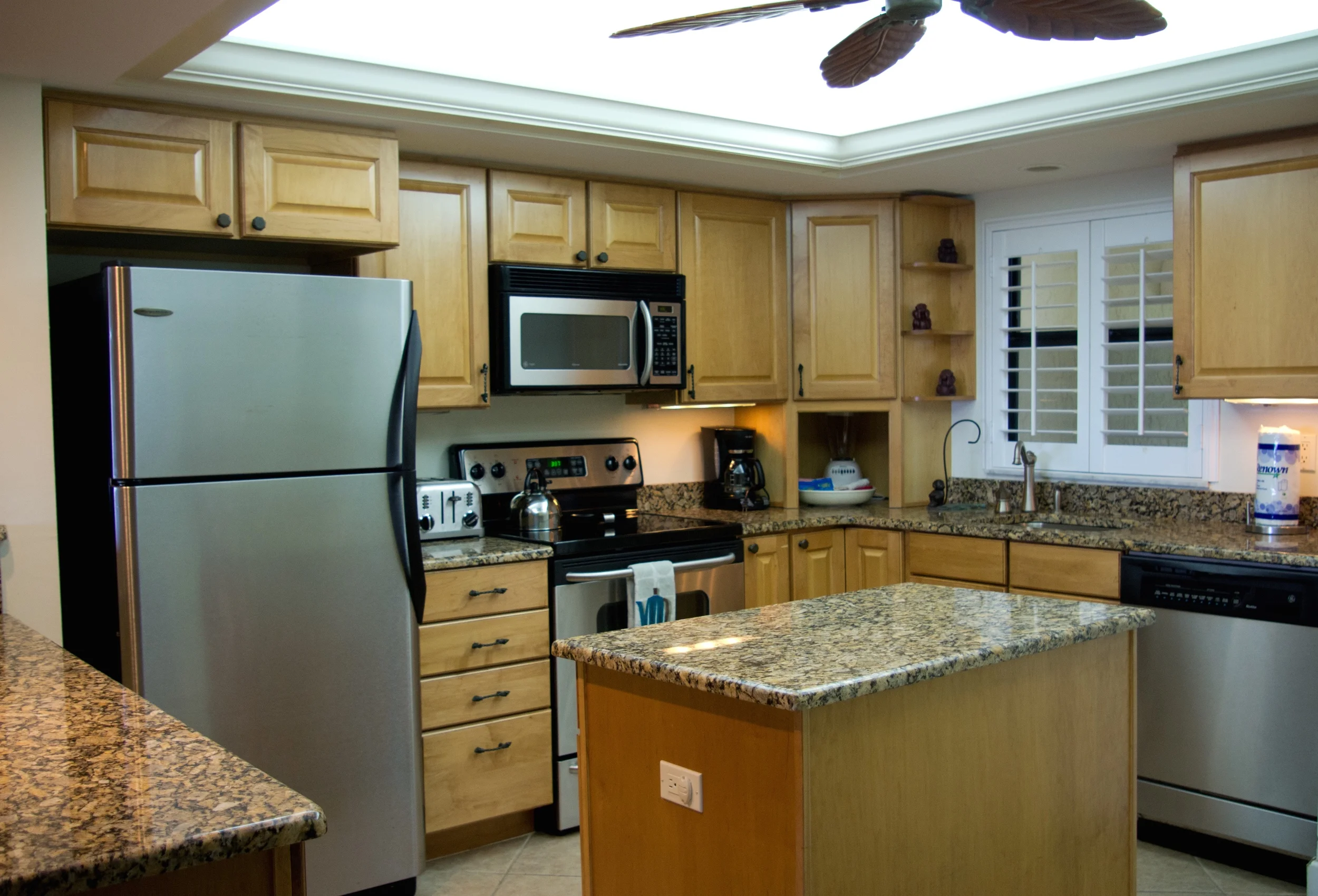 kitchen with granite countertops and stainless steel appliances