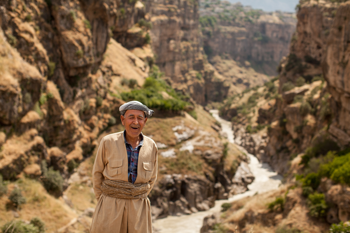  Man smies outside his home on the Rwandz Gorge, Iraqi Kurdistan (2016).  