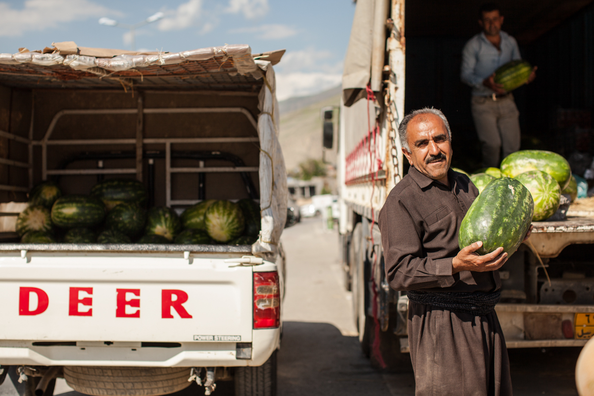  Kurdish man in Soran city with bazaar watermelon called “shifty” (2016). 
