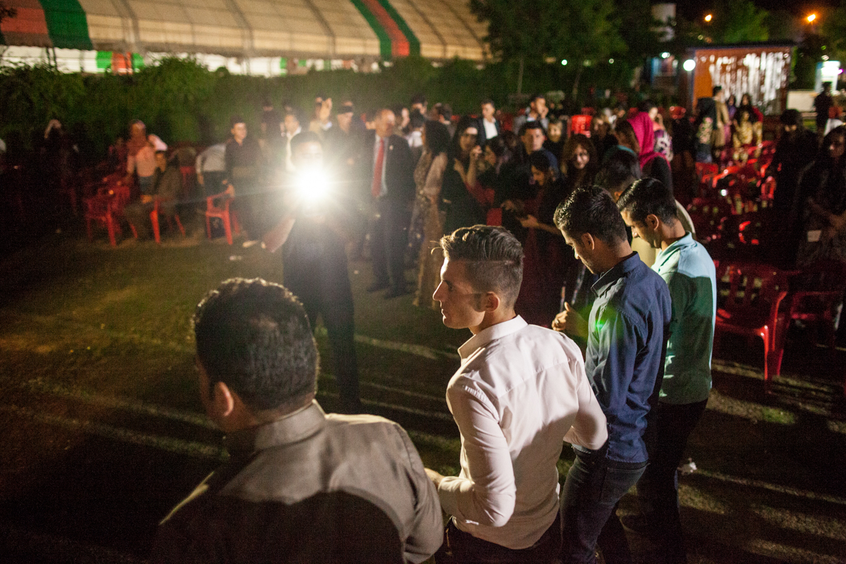  Kurdish men dance at night at Gulan Park, Soran, Iraq (2016). 